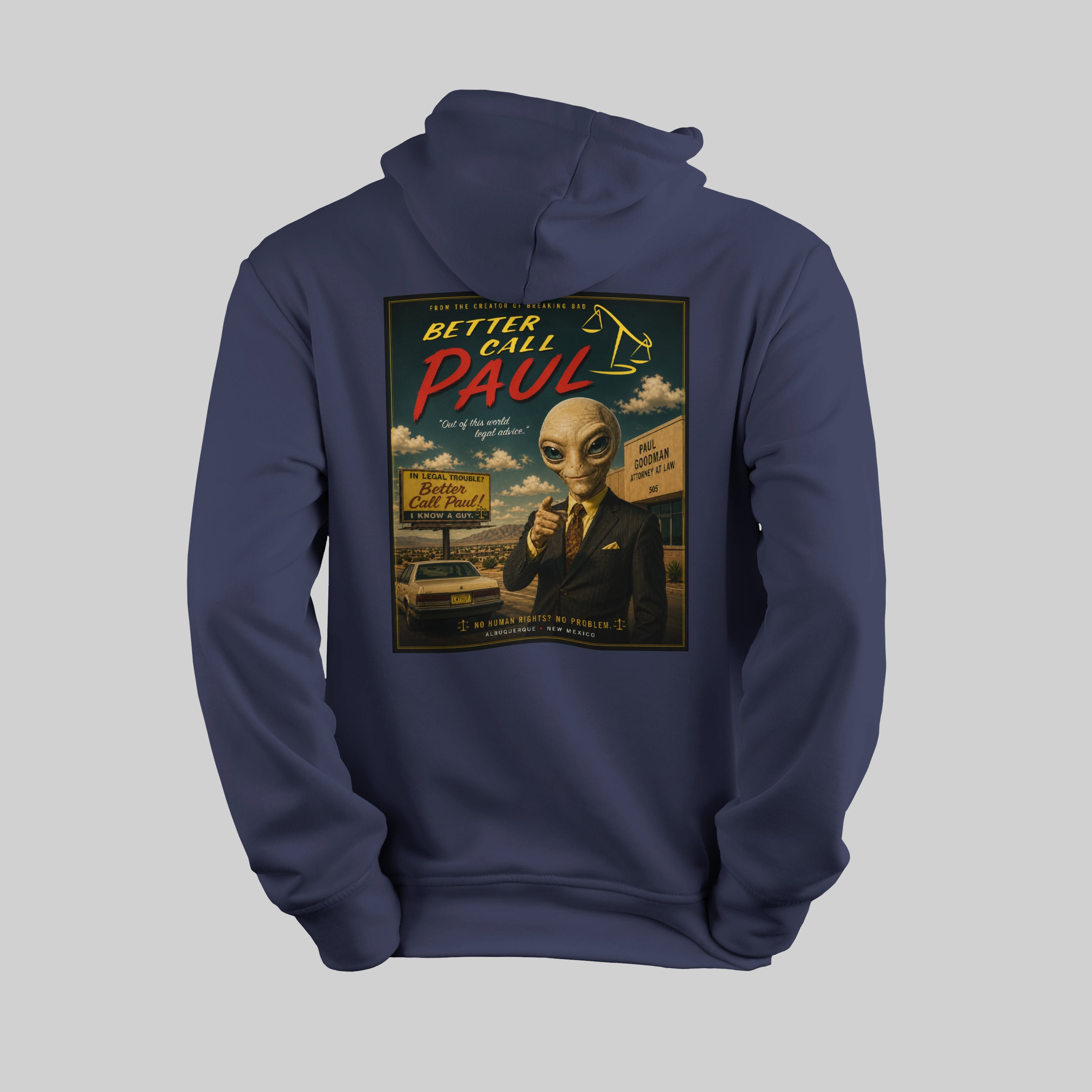 Navy blue hoodie with 'Better Call Paul' alien design on the back against a gray background