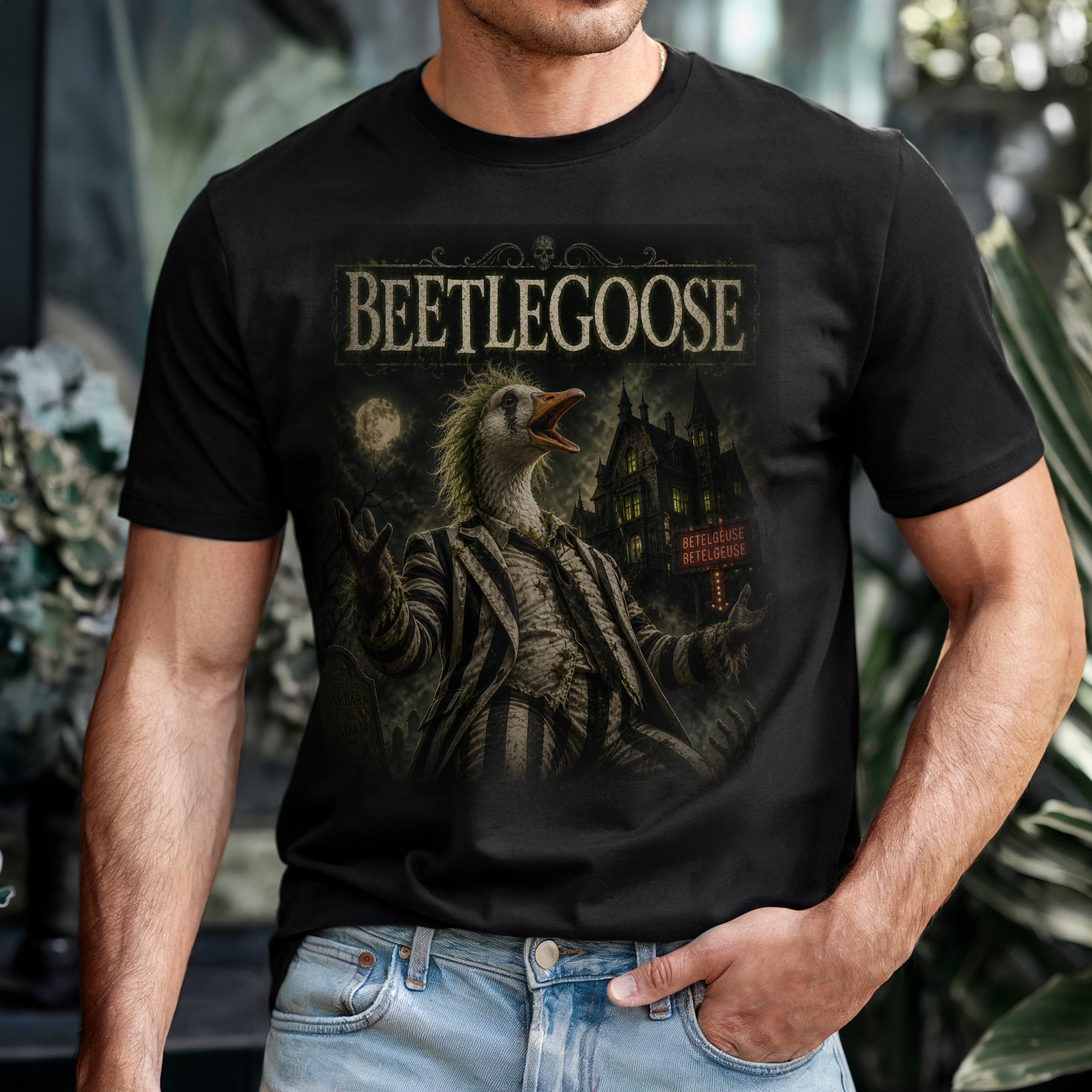Person wearing a black t-shirt with 'Beetlegoose' graphic design.