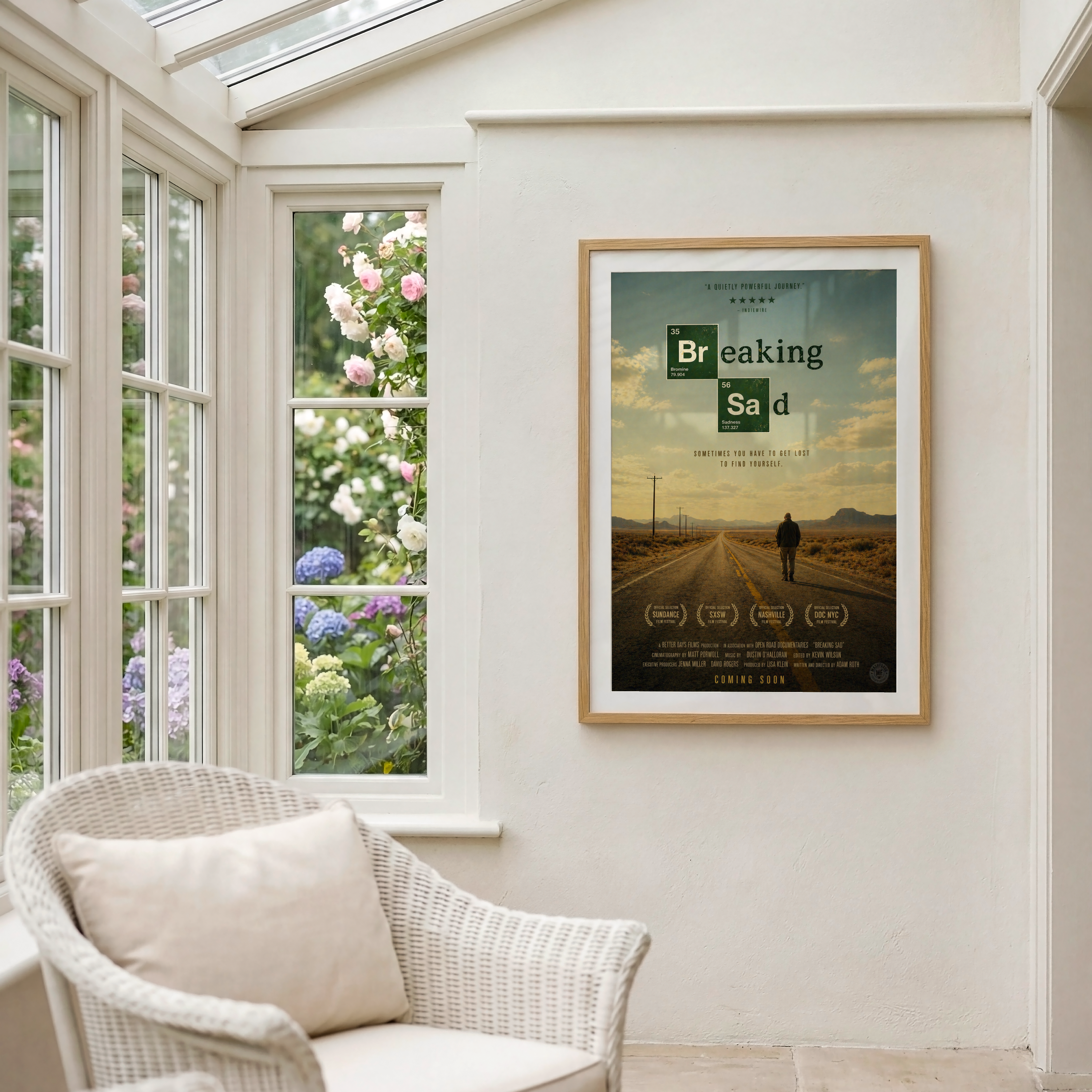 Framed parody Breaking Bad sad poster on a wall with a window showing flowers in the background