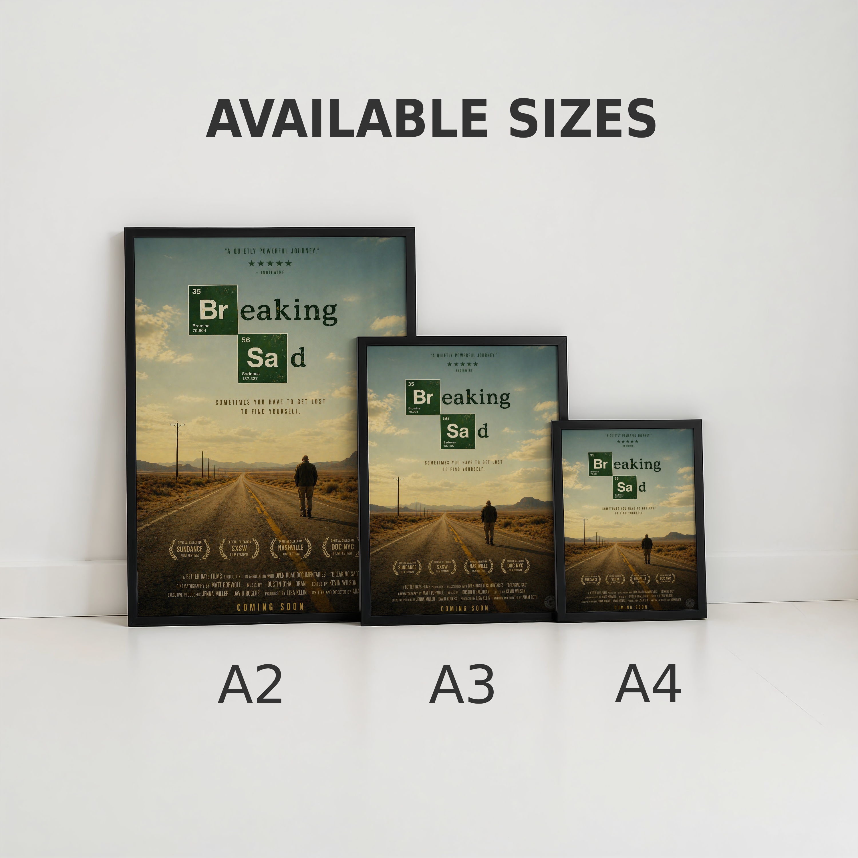 Three framed posters of 'Breaking Bad' with text indicating available sizes A2, A3, and A4 on a white background.