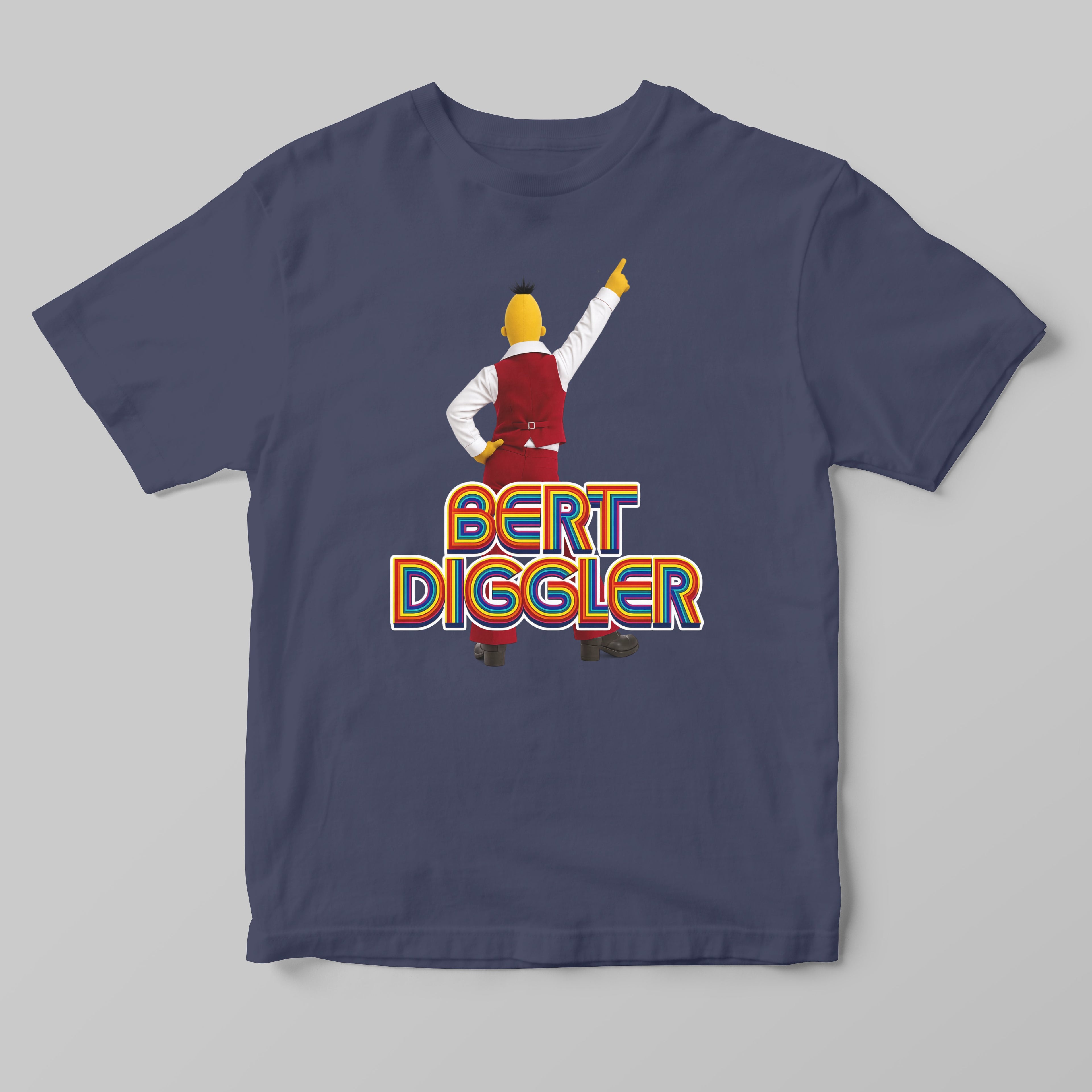 A navy blue short-sleeve t-shirt with a graphic of a dancing character and the text 'BERT DIGGLER' printed on the front, displayed against a neutral gray background.