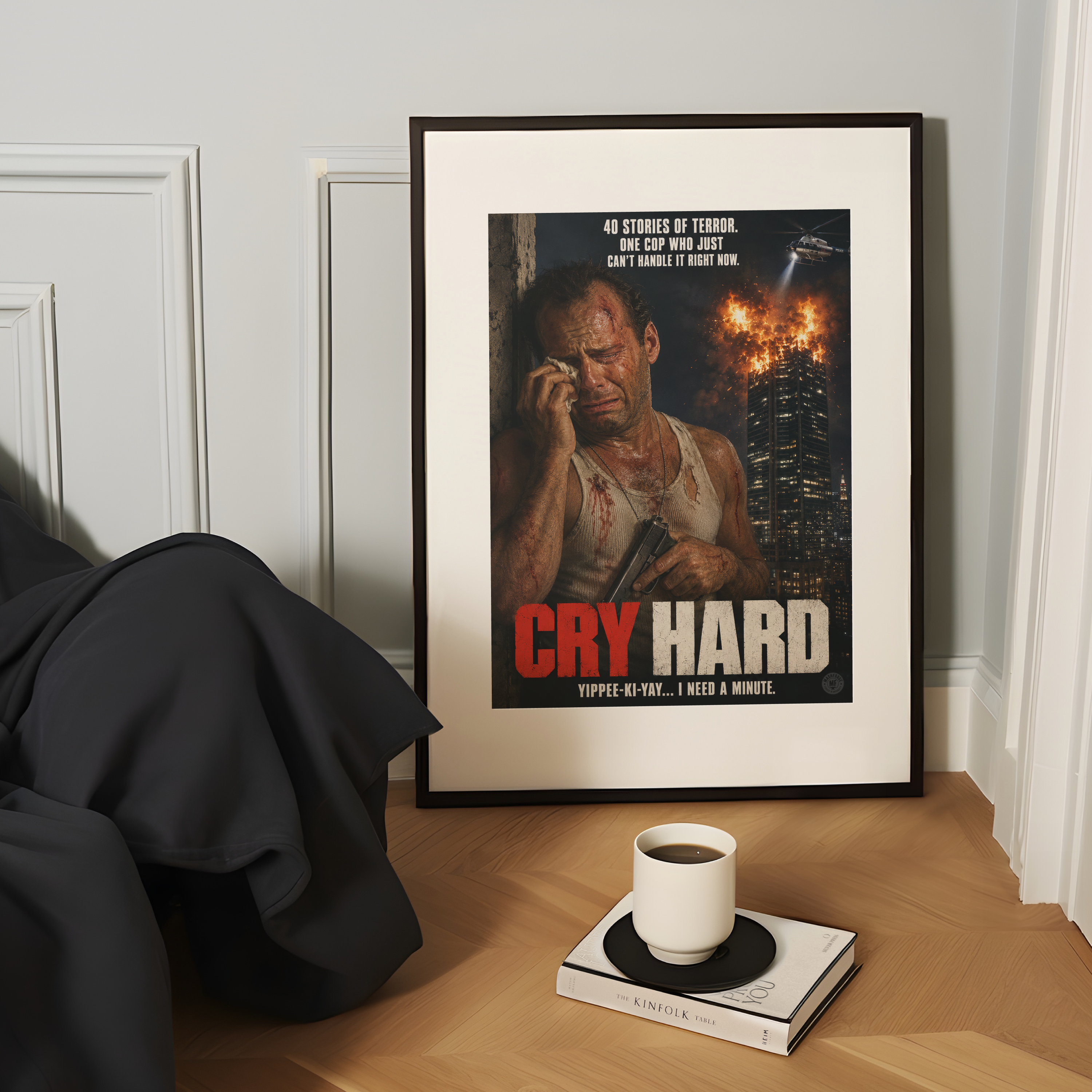 Framed movie poster titled 'Cry Hard' on a wooden surface with a cup and book.