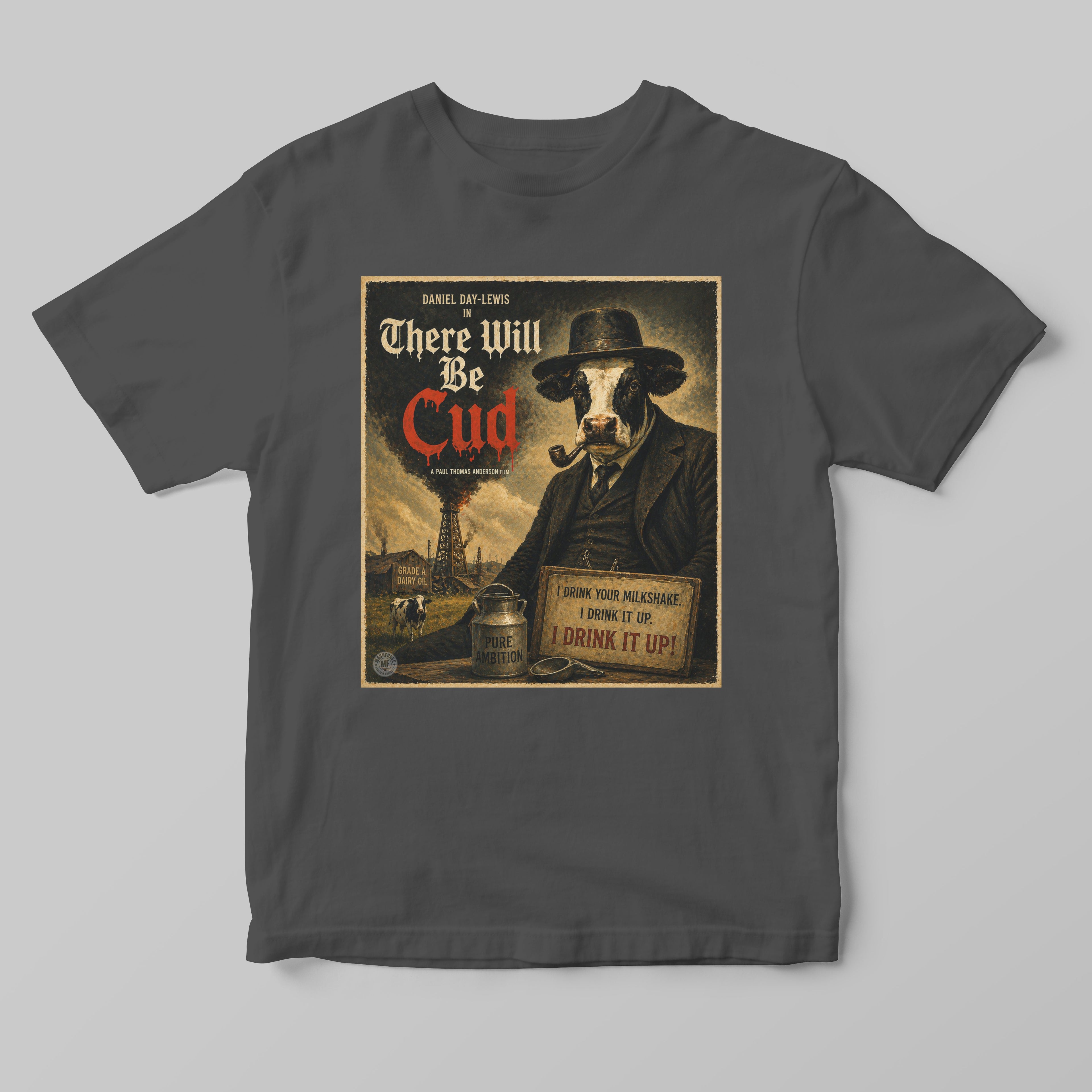 A grey black tshirt with a funny graphic there will be cud cow print