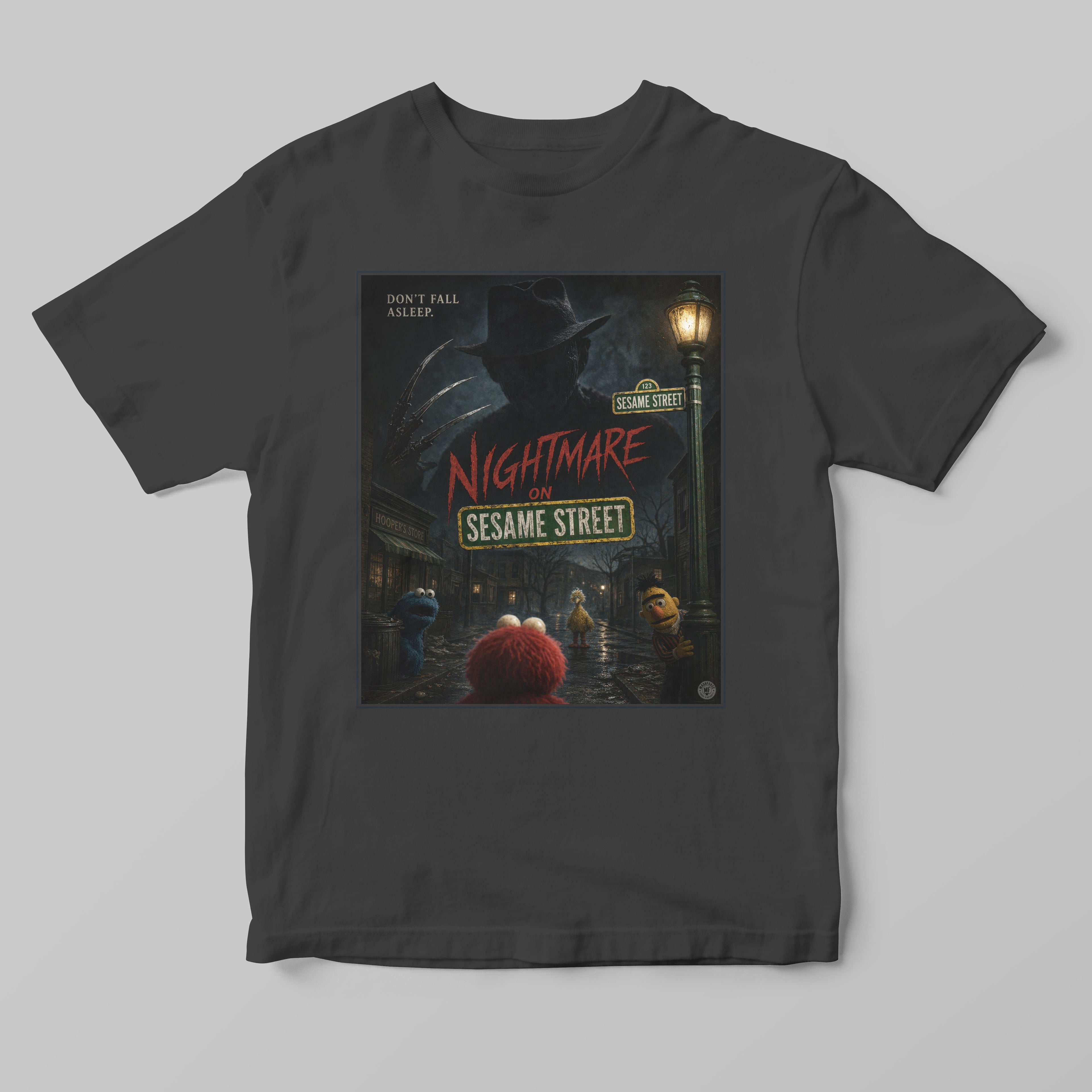 Black t-shirt with 'Nightmare on Sesame Street' graphic design on a gray background