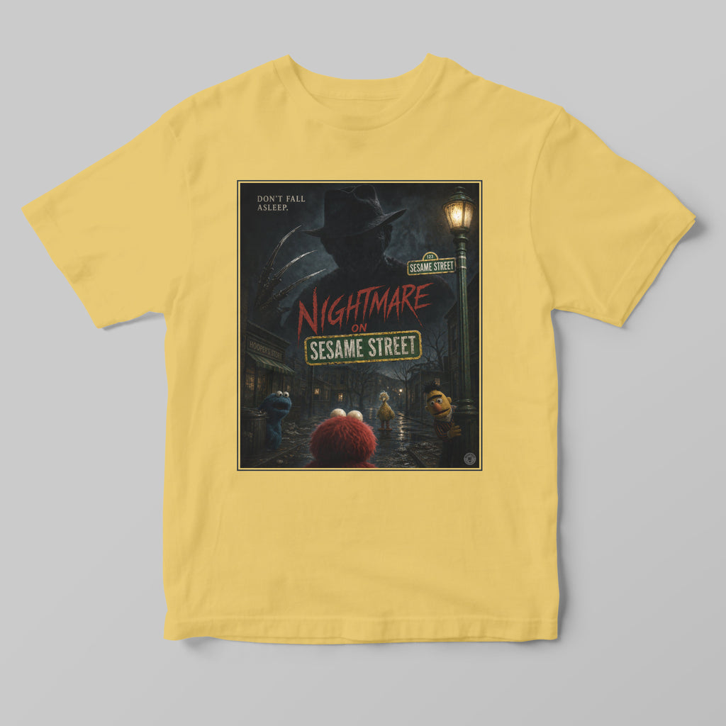 Yellow t-shirt with 'Nightmare on Sesame Street' graphic design on a gray background