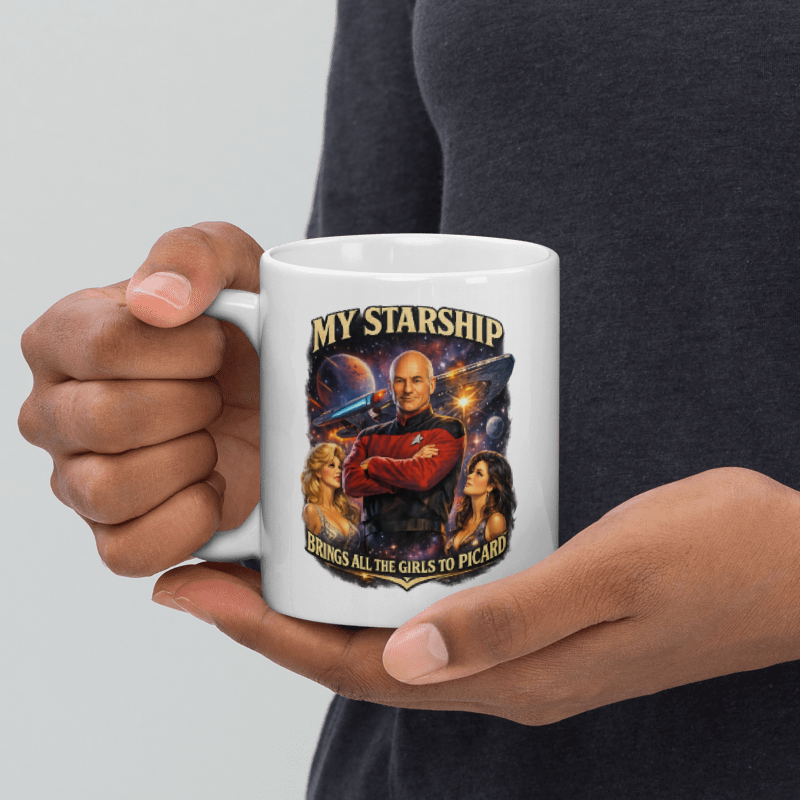 Person holding a mug with Star Trek-themed design featuring Captain Picard and Data.