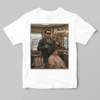 White t-shirt with 'The Perminator' graphic design featuring a terminator man and woman in a barbershop.