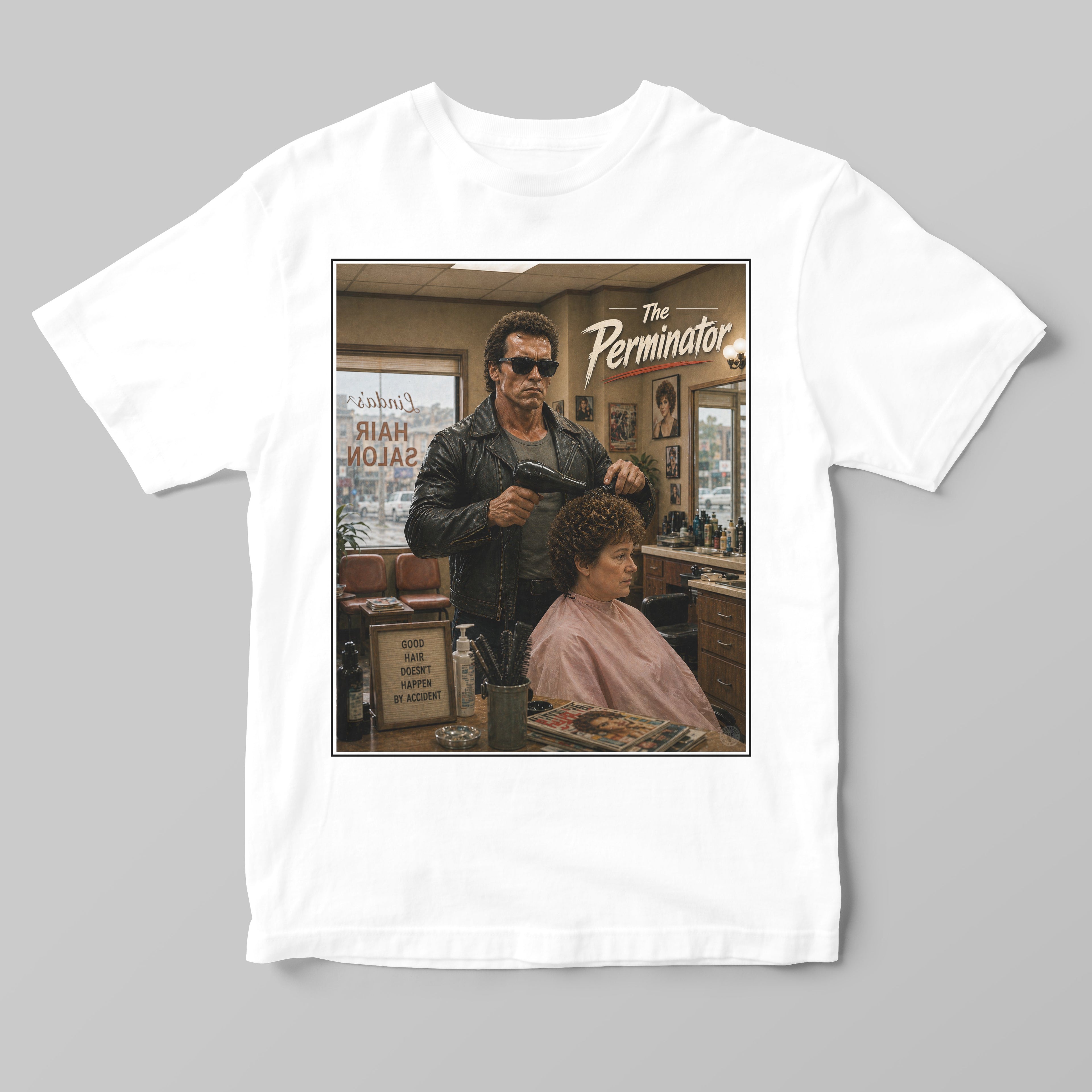 White t-shirt with 'The Perminator' graphic design featuring a terminator man and woman in a barbershop.