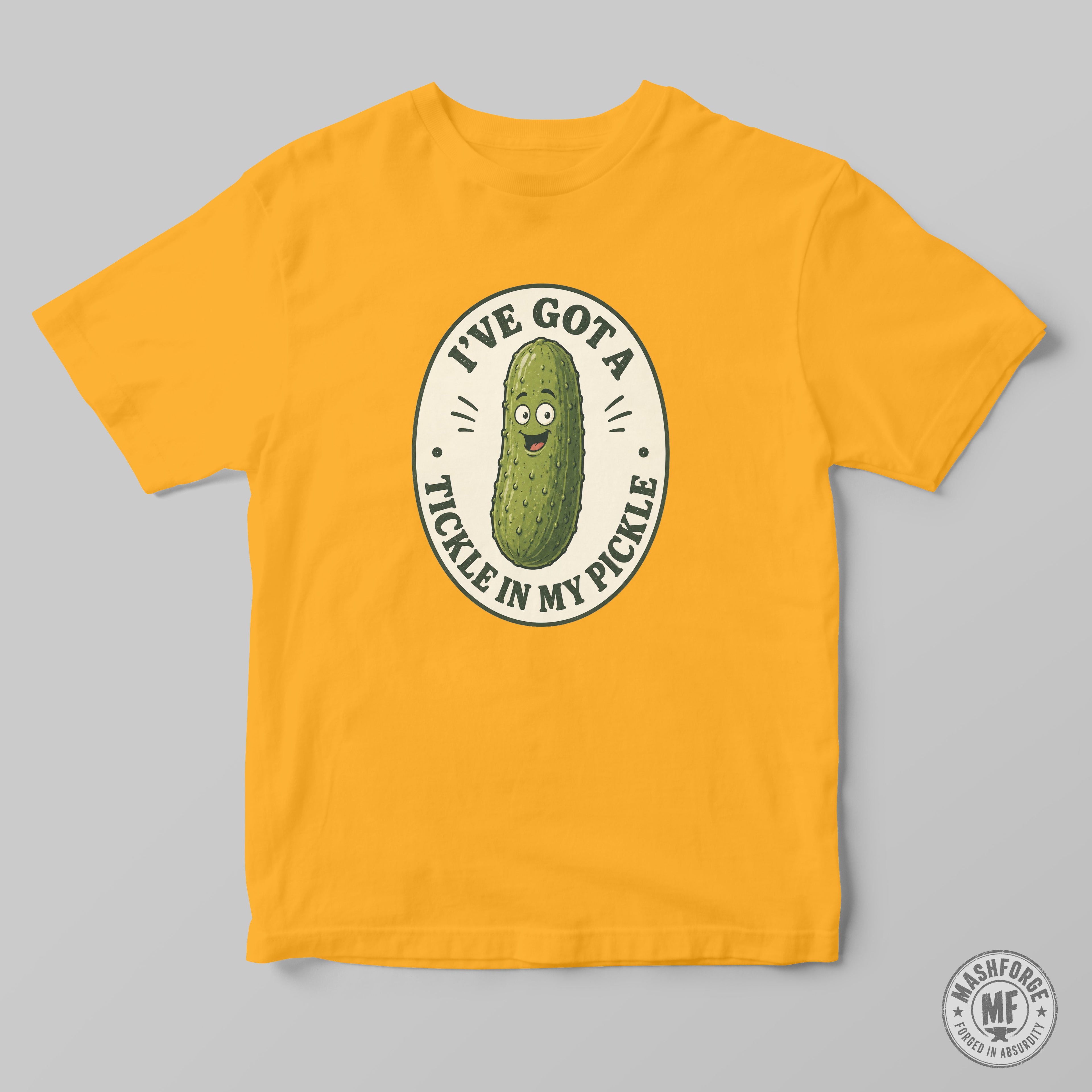 A gold yellow mashforge t-shirt with a funny design saying I've got a tickle in my pickle