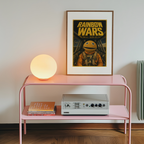 Pink shelf with a lamp, records, and 'Rainbow Wars' poster on a white wall.