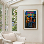 Framed 'Weekend at Bernie's' poster on a wall with a chair and window in the background