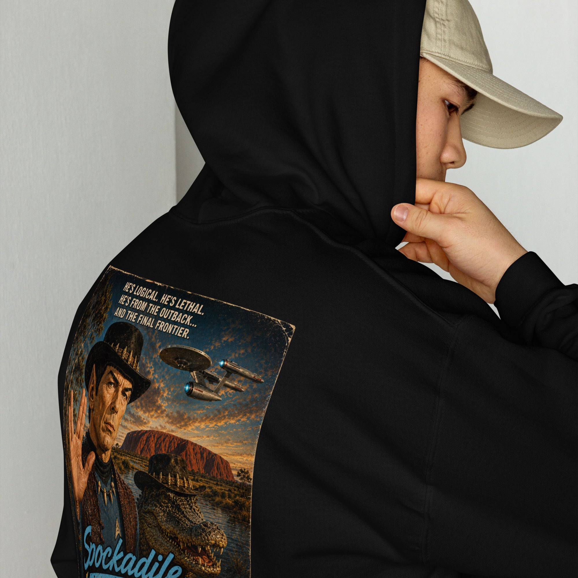 Person wearing a black hoodie with a Star Trek-themed graphic on the back.