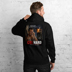 Man wearing a black hoodie with a graphic print and text 'Die Hard' on the back, against a white brick wall.