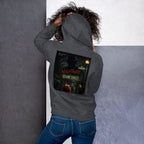 Person wearing a hoodie with 'Nightmare on Sesame Street' graphic on the back against a gray wall.