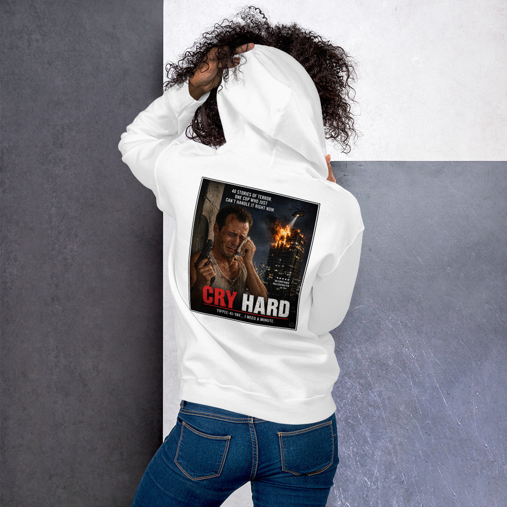 Person wearing a white hoodie with a graphic design on the back, featuring text 'Cry Hard' and the actor Bruce Willis.
