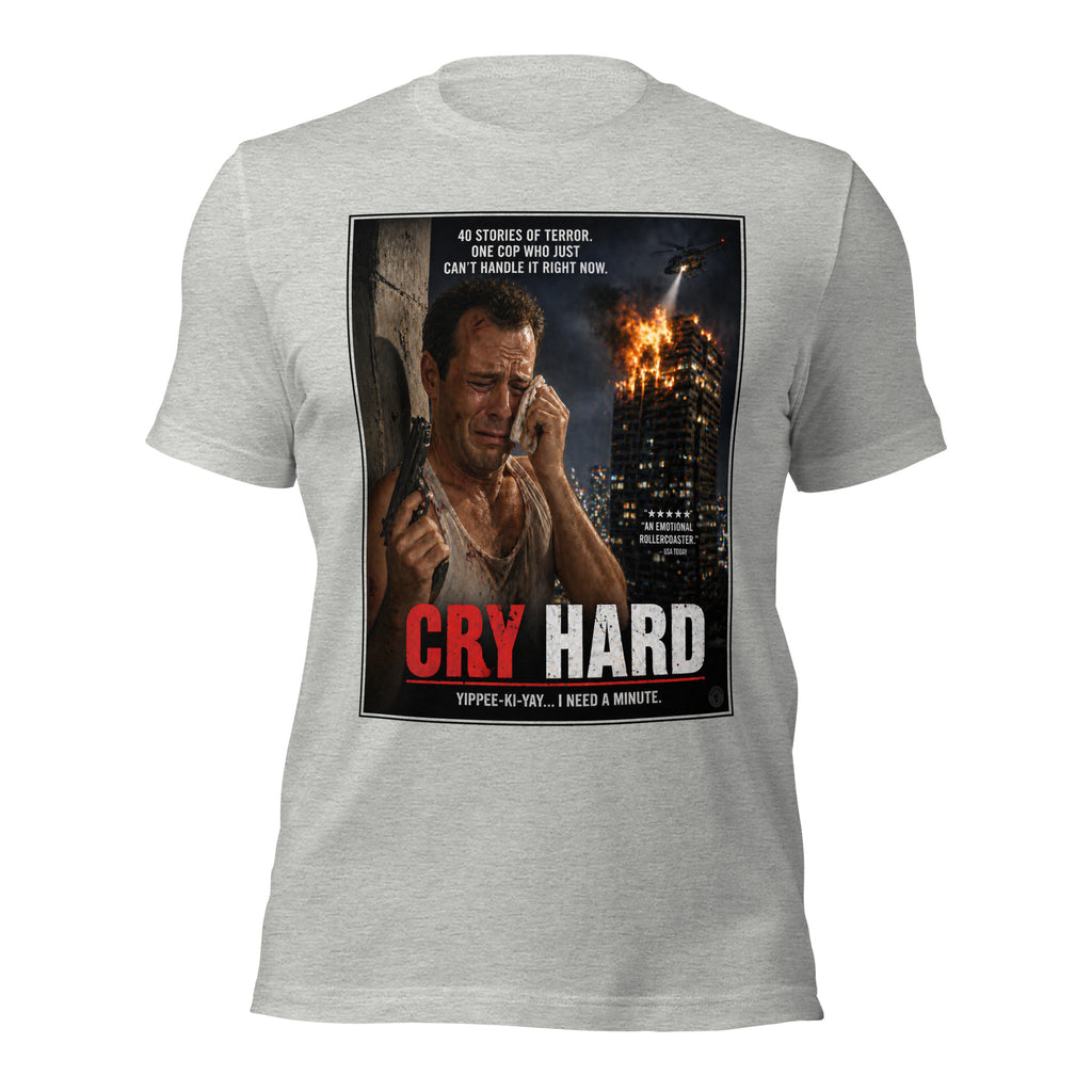 Gray t-shirt with a graphic design featuring a crying man with a gun and text 'Cry Hard' on a white background.