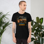 Man wearing a black t-shirt with text standing in front of plants