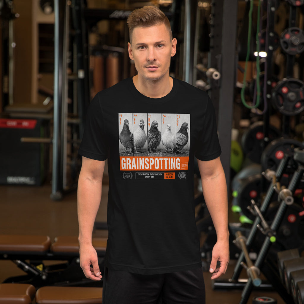 Man wearing a black t-shirt with 'Grainspotting' graphic in a gym setting