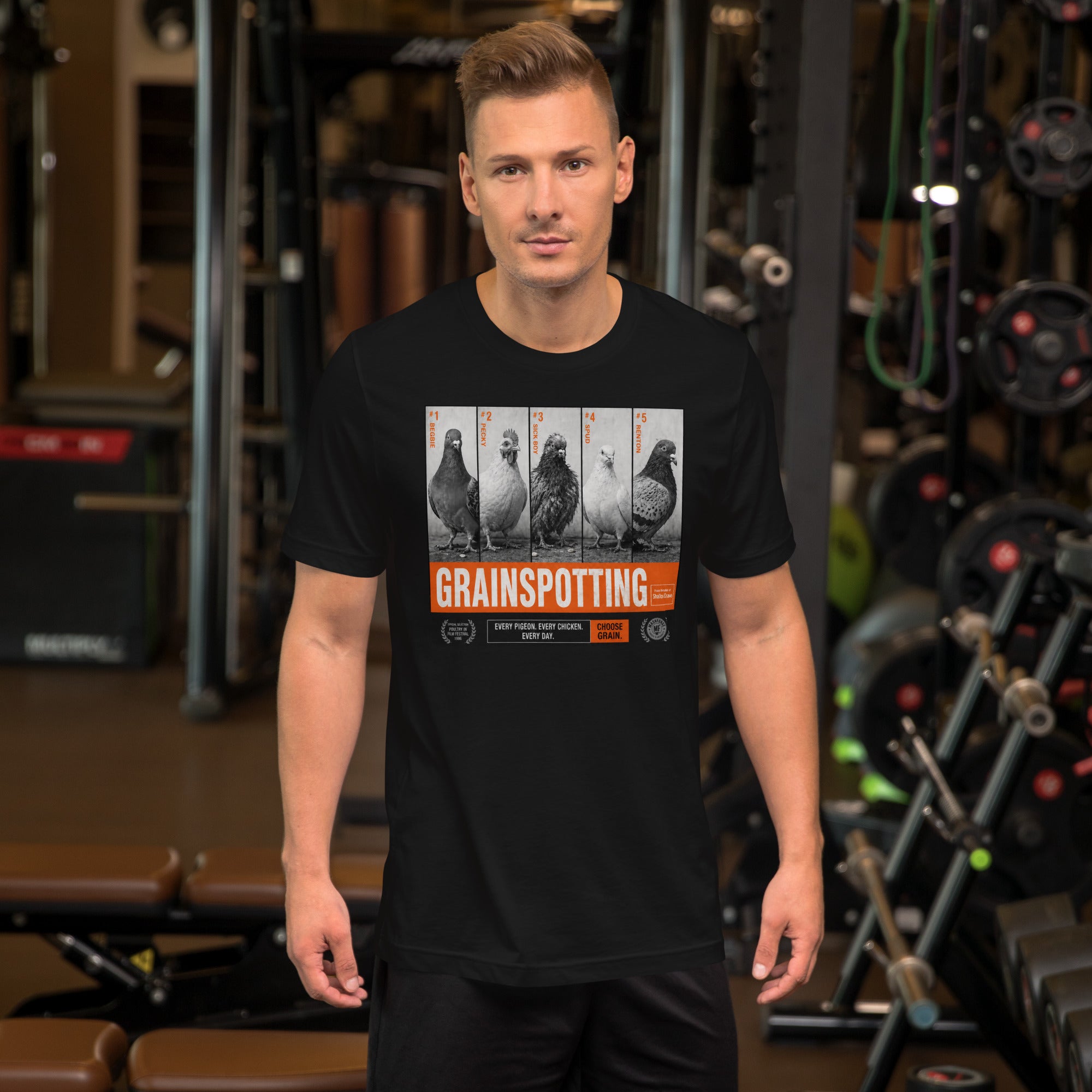 Man wearing a black t-shirt with 'Grainspotting' graphic in a gym setting