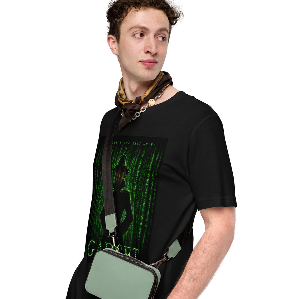 Man wearing a black t-shirt with a graphic design and holding a green bag on a white background