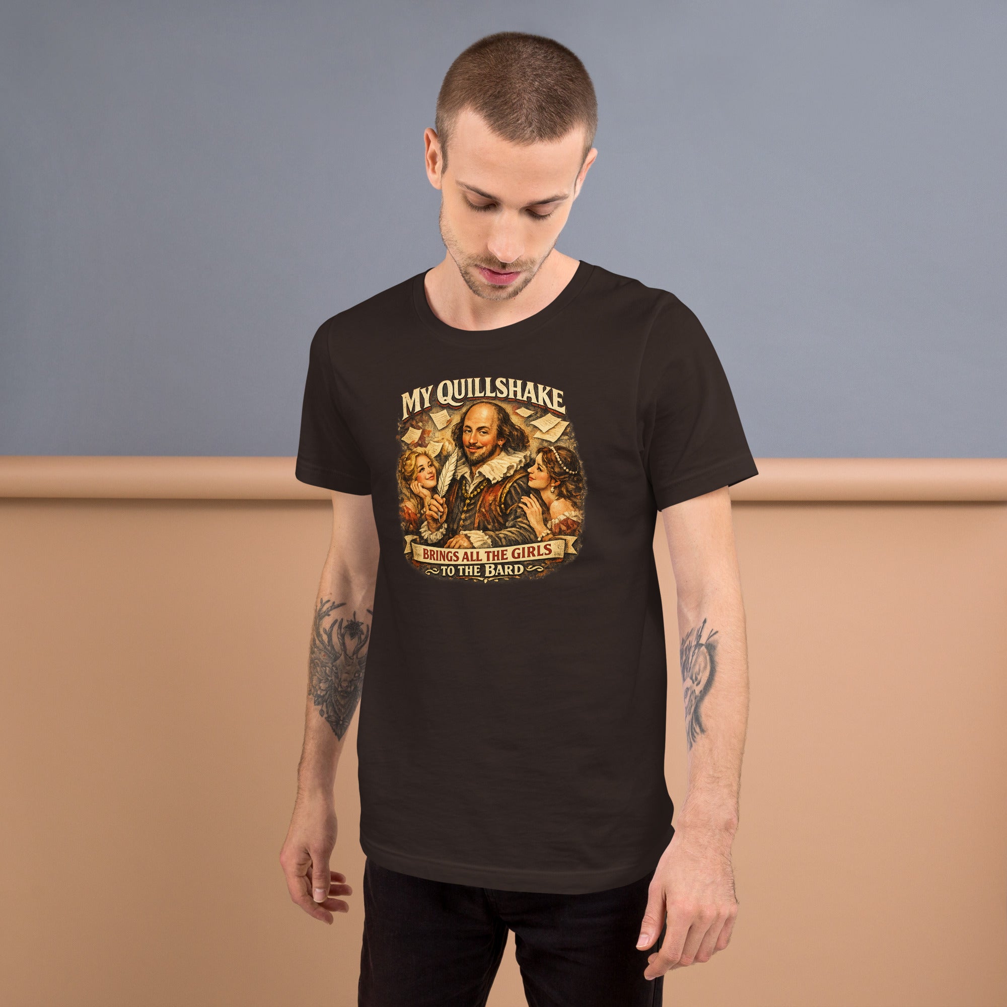Man wearing a black t-shirt with a graphic design and text, standing against a plain background.