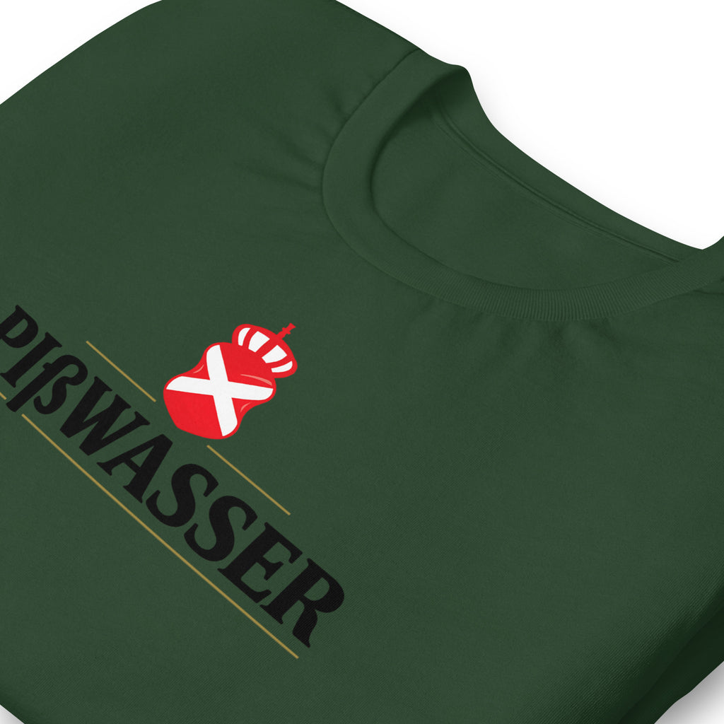Close-up of a dark green t-shirt featuring a graphic print of a red and white saltire flag with a crown, above the word 'PIBWASSER' in black with gold accent lines.