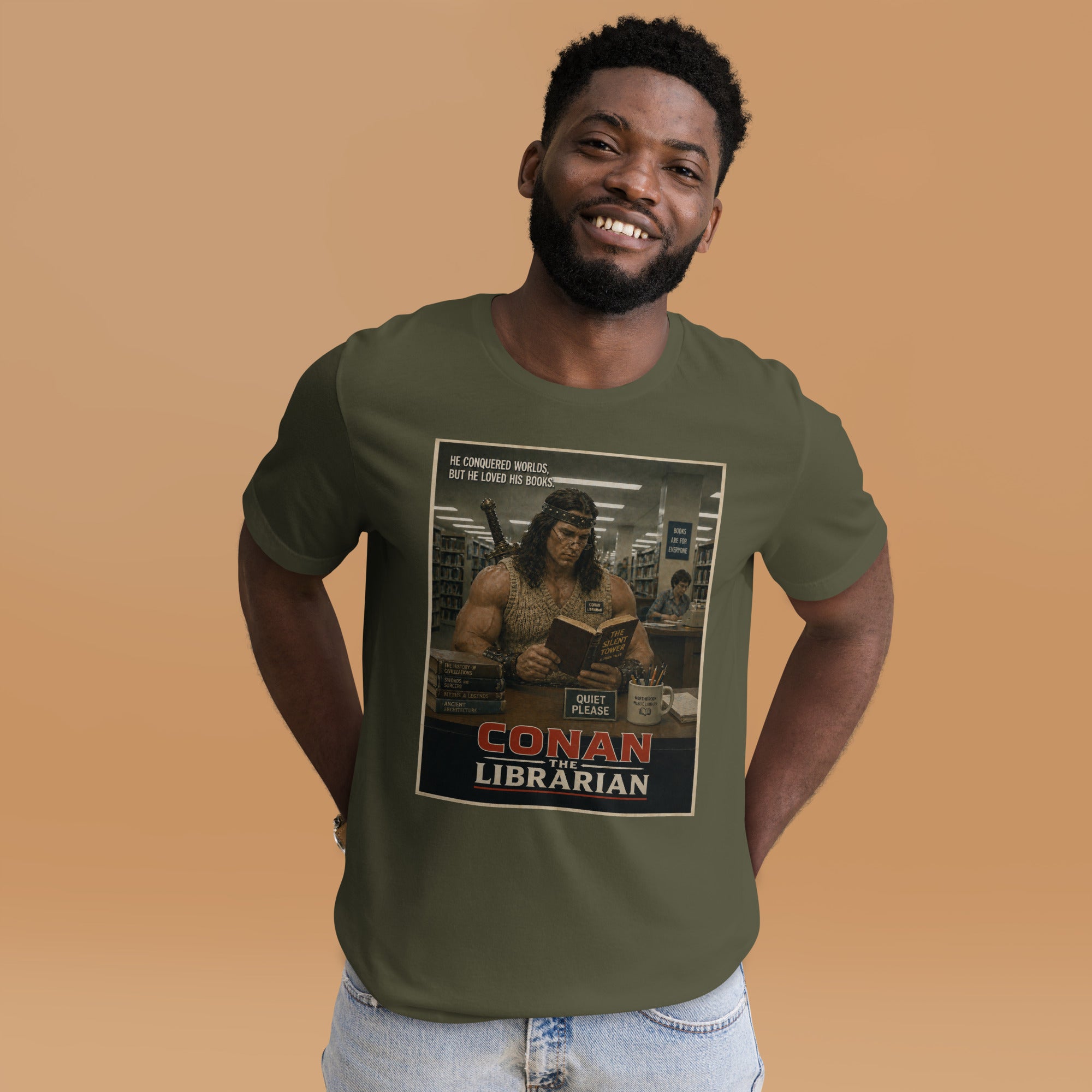 Man wearing a green t-shirt with a funny 'Conan the Librarian' graphic design on a beige background