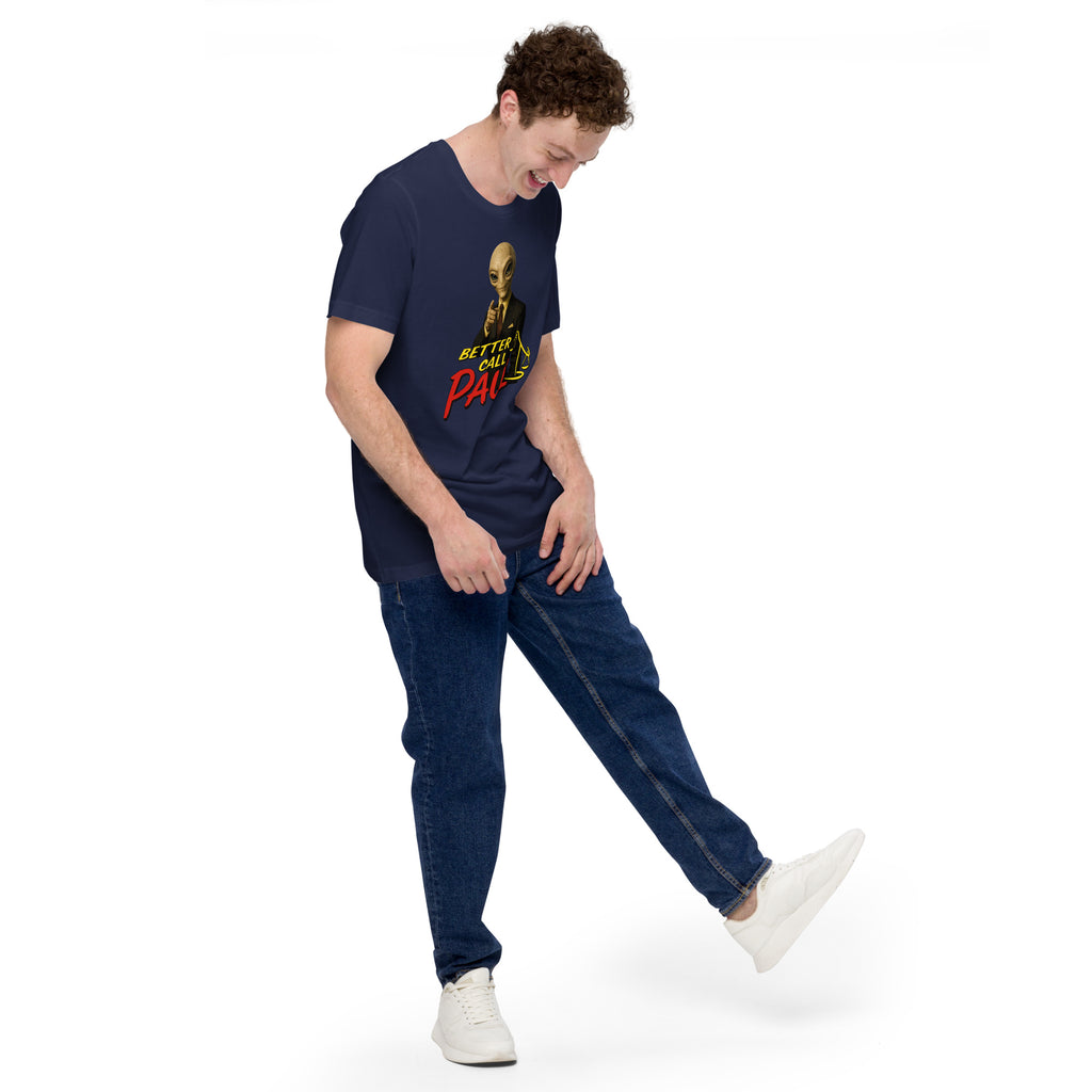 Person wearing a purple t-shirt with a graphic design, blue jeans, and white sneakers on a white background