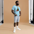 Man wearing a light blue t-shirt with graphic design on a brown backdrop