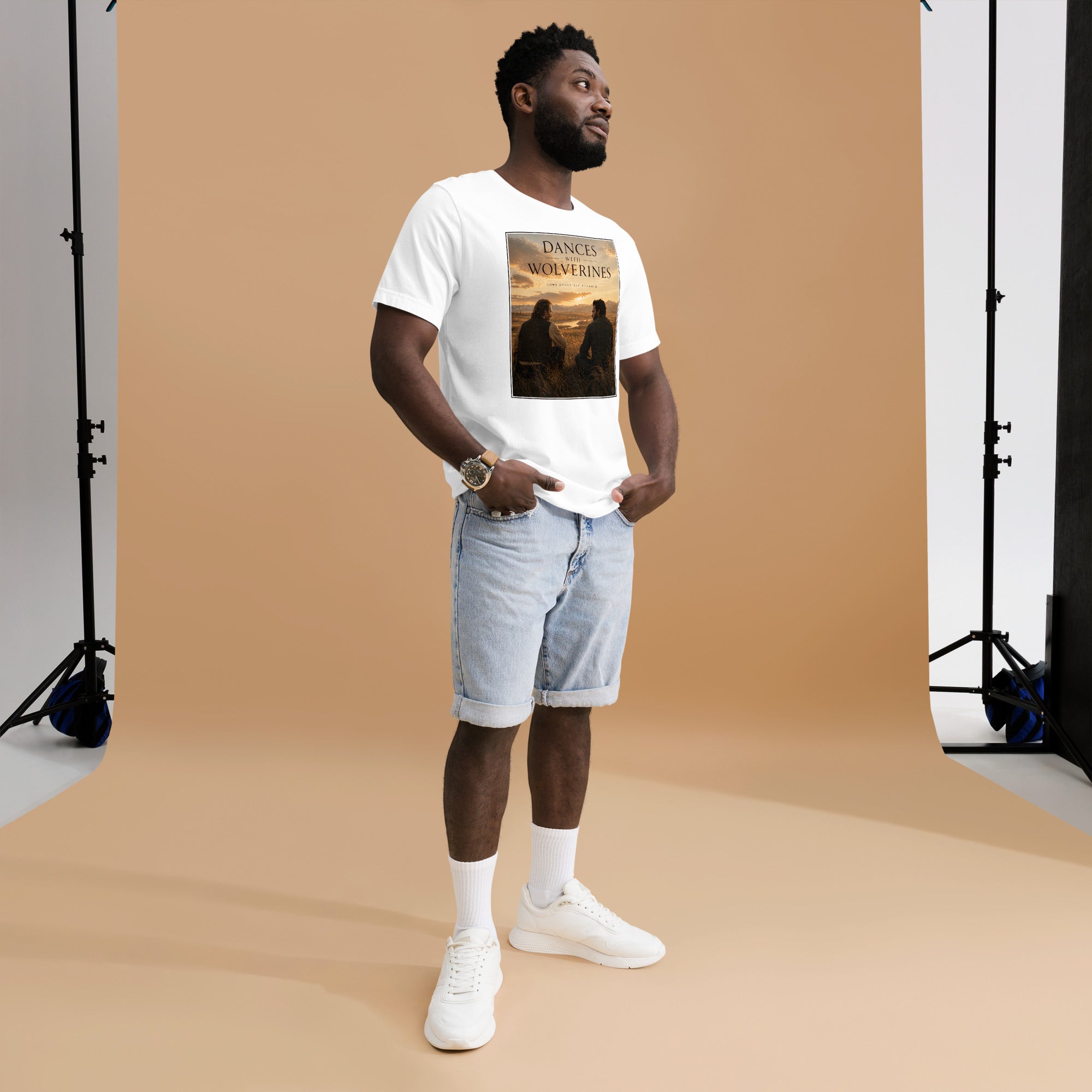 Man wearing a white t-shirt with a graphic design in a studio setting