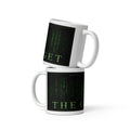 Two white mugs with Matrix-style text design on a white background