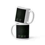 Two white mugs with Matrix-style text design on a white background