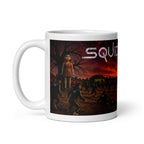 Mug with a graphic design featuring a large figure and people, with 'Squid Game' text on a white background.