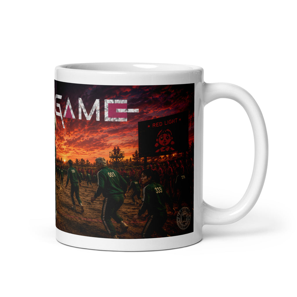 Mug with a graphic design of people playing a game at sunset, featuring the word 'GAME'.